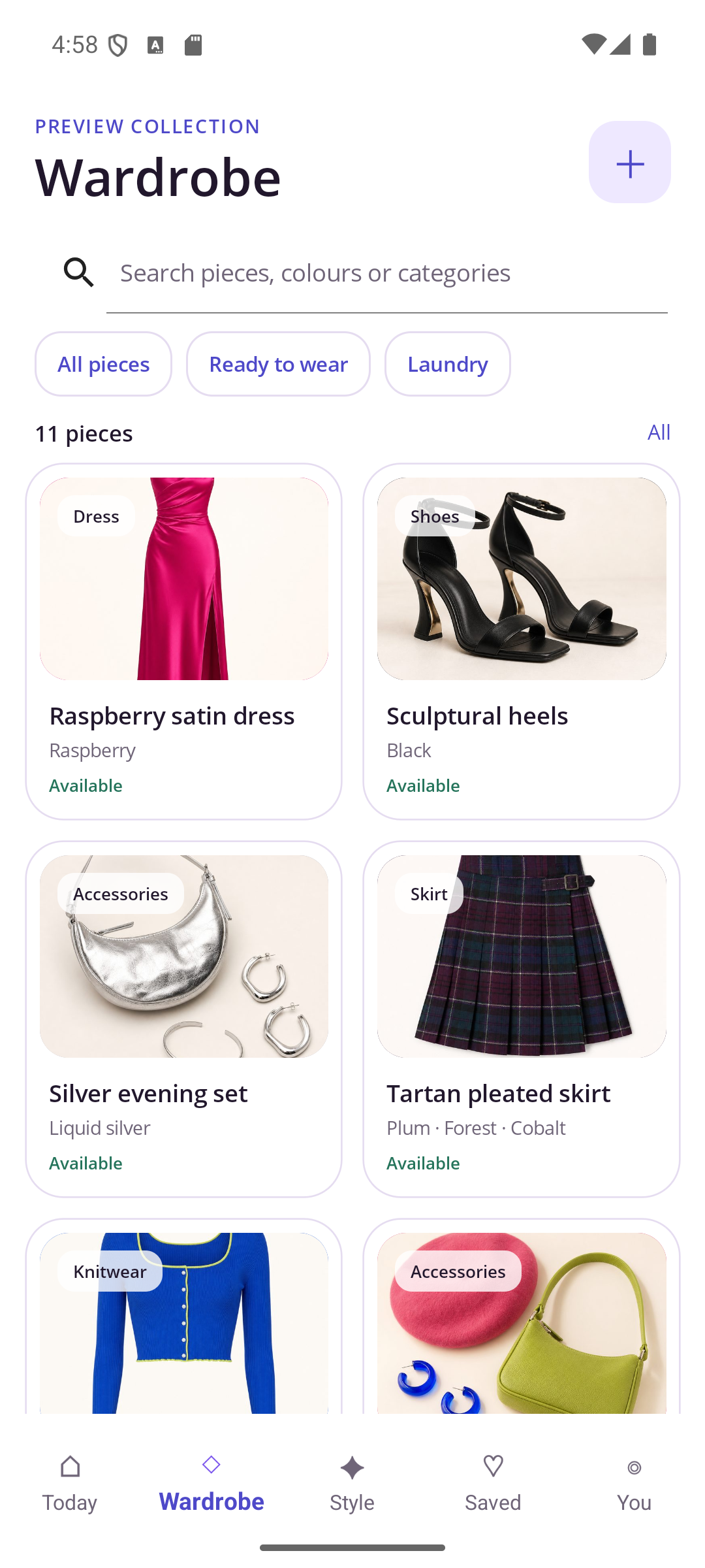 StyleIrisT wardrobe screen showing searchable clothing cards